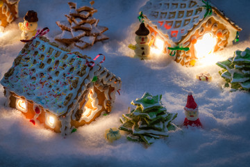 Small gingerbread houses in the snow