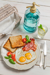 Eggs, toast and bacon for a summer breakfast