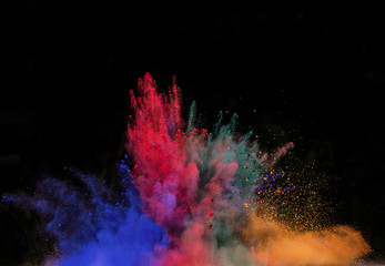 colored dust explosion on black background