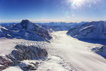 Swiss Aletch glacier fall helicopter view in winter