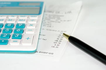 receipt paper and calculator