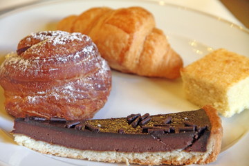 Pastries and tart on plate