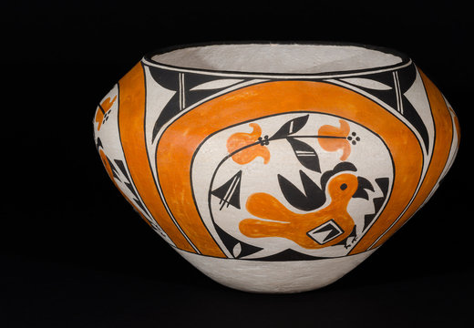 Traditional Native American Pueblo Pottery on white background.