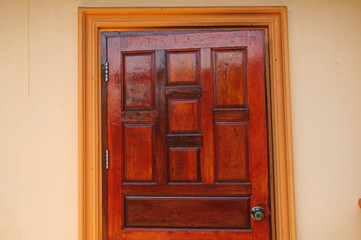 Fototapeta na wymiar wood door with Thai pattern in Thai style home