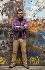 Man With Beard And Glasses On Rainy Day Graffiti Wall