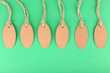 Brown tags on colorful background