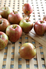 Juicy apples on wooden background