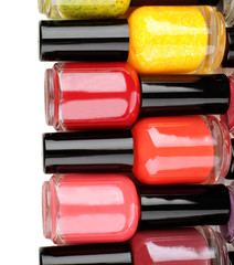 Colorful nail polishes, isolated on white