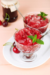 Closeup of cherry granita in glass bowl,