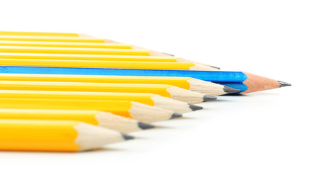 Fototapeta premium Individuality concept. Pencils isolated on white
