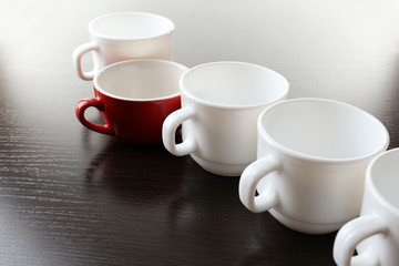Individuality concept. Group of cups close up
