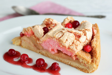 Piece of tasty pie with apples and berry mousse,