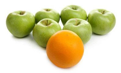 Juicy apples and orange, isolated on white