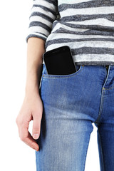 Smart phone in pocket jeans close-up