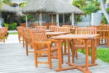Fototapeta na wymiar Outdoor cafe on tropical beach at Caribbean