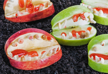 jaw with teeth of apples and nuts for Halloween