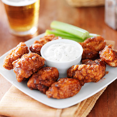 boneless buffalo bbq chicken wngs with ranch sauce and beer