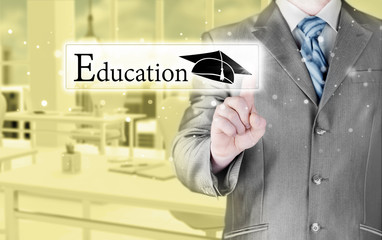 business man pointing 'education' concept