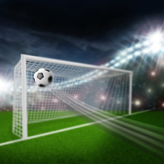 soccer ball flies into the goal