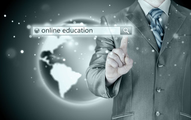 Online education written in search bar on virtual screen.