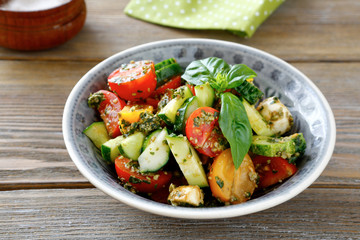 salad with vegetables and pesto in bowl