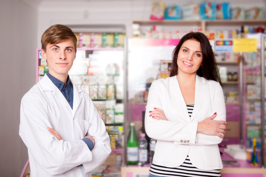 Customer and pharmacist smiling