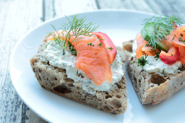 Fresh norwegian salmon and white cheese on crunchy bread