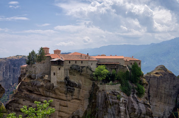 Fototapeta na wymiar Monastery on top of a rock in Meteora, Greece