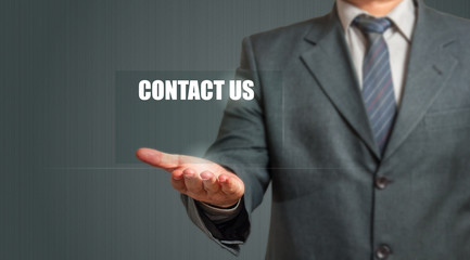 Business Man Showing Contact Us Sign