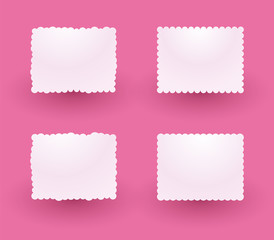 white decorative labels on a pink background