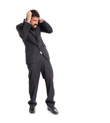 Frightened businessman over isolated white background