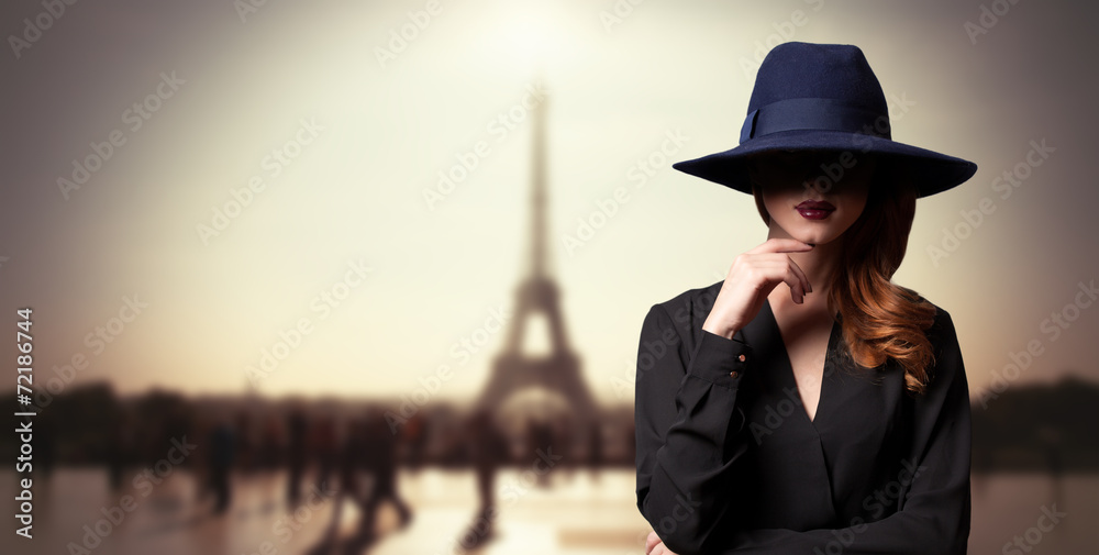 Poster style women in hat and parisian background