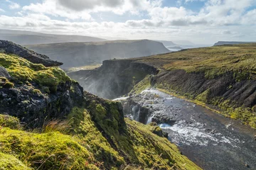 Gordijnen Scenic view of wild Icelandic landscape with river. © 1tomm