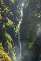 Naklejka na ściany i meble Aerial view of Glymur Waterfall, Iceland..