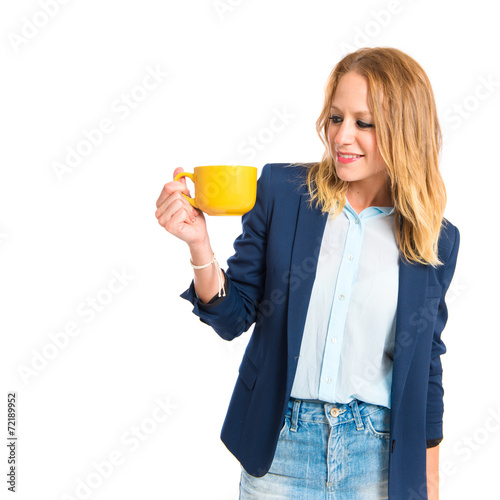 Blonde Girl Holding A Cup Of Coffee Over White Backgrou