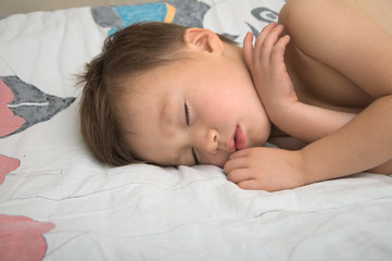 Fototapeta na wymiar Adorable boy sleeping