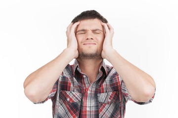 man having headache on white background.