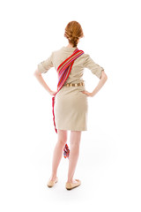 model isolated on plain background back hands on hips