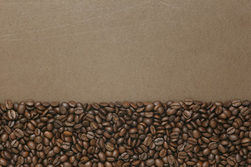 Caffe edition, coffee beans on old brown paper