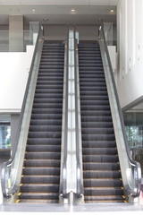 Empty escalator stairs in the modern office