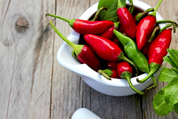 red chili pepper on old wooden table