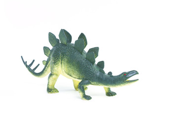 Fototapeta premium Stegosaurus dinosaur toy on white background