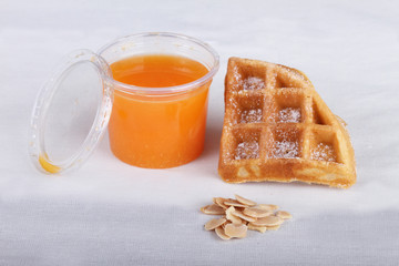 homemade almond waffle with orange juice