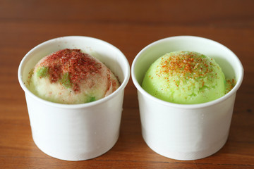 ice cream scoops on wooden plate