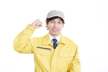 ガッツポーズの笑顔の男性