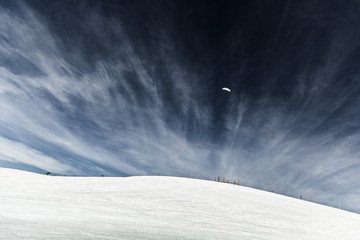 Paraglider against blue sky with beautiful clouds 