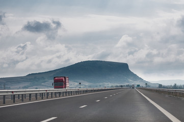 red truck on the highway