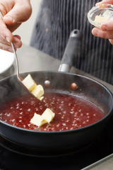 chef making sauce