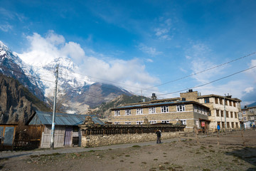 Manang village on a Annapurna Circuit turists trek in Himalayan