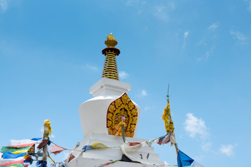 Buddhist stupa with colorful flags in Annapurna area, Himalayas
